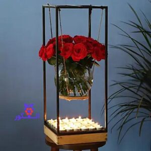 استند گل شب نشین با گل رز و شمع مناسب برای جشن کریسمس - جشن سال نو - خرید گل کریسمس - گل فروشی آنلاین
