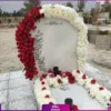 گل‌آرایی دور سنگ قبر ملال دوری - Image 2