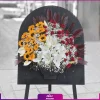 مینی تاج گل با گلهای لیلیوم و رز و آفتابگردان به همراه گلدان