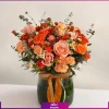 گل رز و گل میخک در دسته گل پاییزی