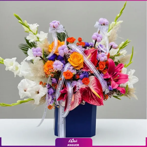 باکس گل با گلهای گلایول و لیلیوم به رنگ شادی